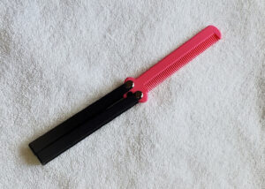 Black Handle, Pink comb