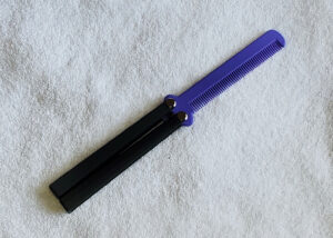 Black Handle, Purple Comb