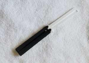 Black Handle, White silk comb