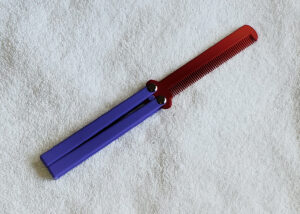 Purple Handle, Red Comb