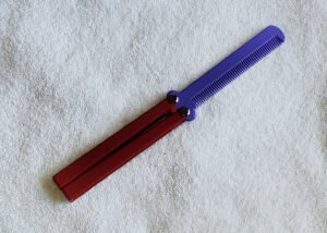 Red Handle, Purple Comb